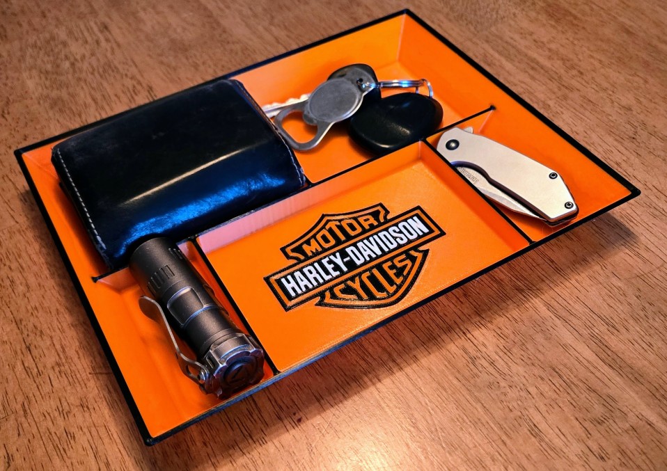 Sektsioonidega taskutühjendaja (Harley-Davidson stiilis)